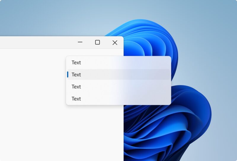 Roh okna Windows 11 s tlacidlami minimalizovat, maximalizovat a zavriet, z ktoreho je vysunuta priesvitna ponuka so styrmi polozkami; jedna je zvyraznena modrym pruzkom. Vpravo presvita modra kvetinova tapeta Windows 11, cim vidno efekt matneho skla.